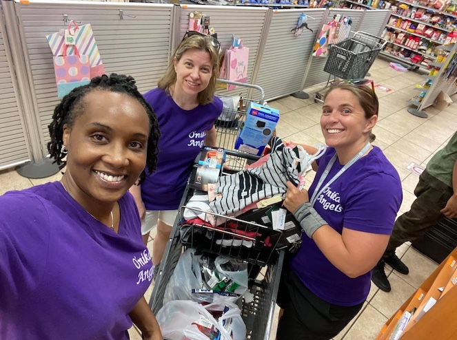 O'nika's Angels working together to shop for goods to distribute after George Floyd's death.