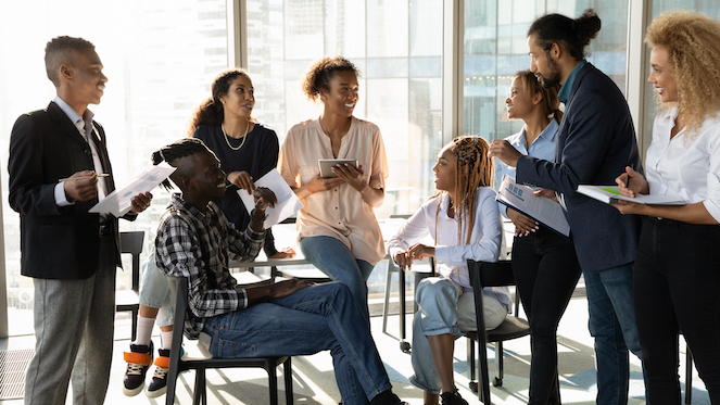 A boss communicating and engaging his team in a good culture